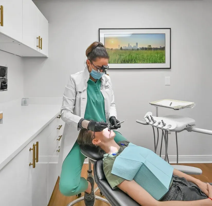 Dr. Hotic treating a patient in the Uptown Charlotte operatory