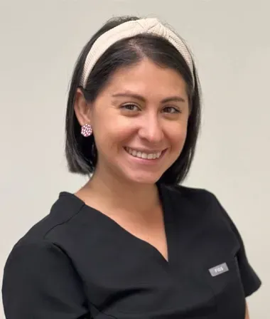 Dentistry of Uptown Charlotte team member welcoming a patient